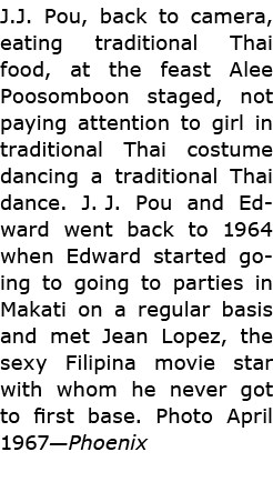 ﻿J.J. Pou, back to camera, eating traditional Thai food, at the feast ﻿Alee Poosomboon staged, not paying attention ...